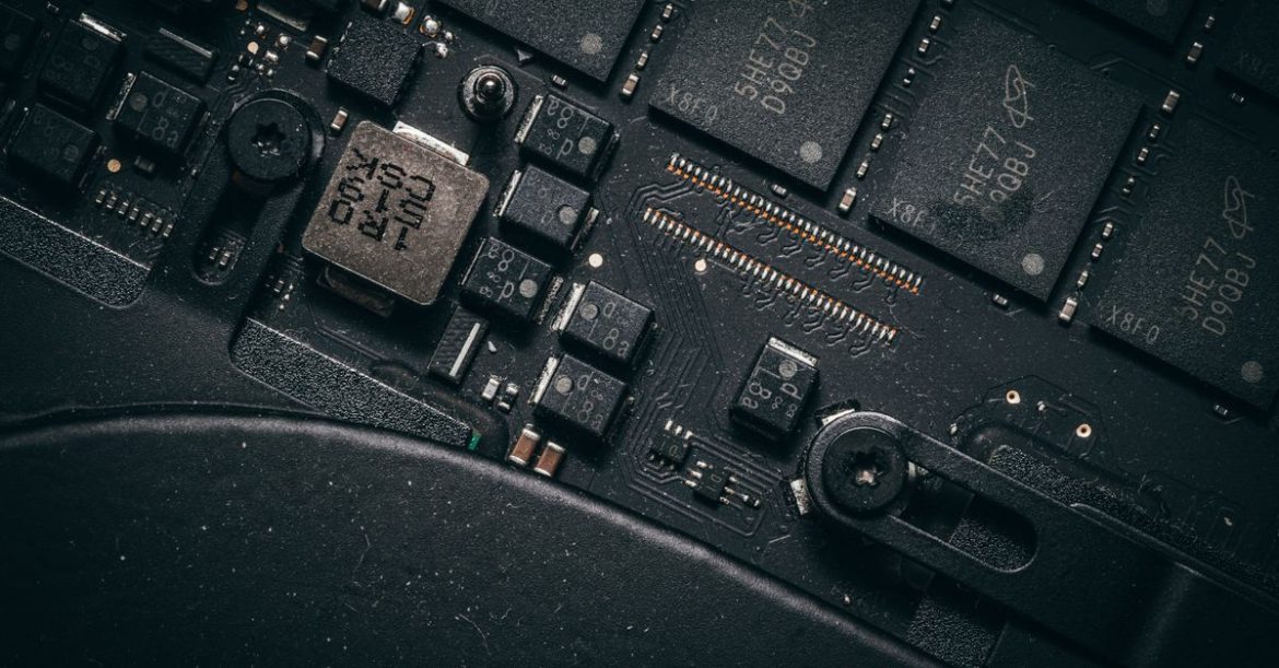 Close-up of a motherboard UEFI firmware chip, illustrating the UEFI Secure Boot bypass found in old signed shims