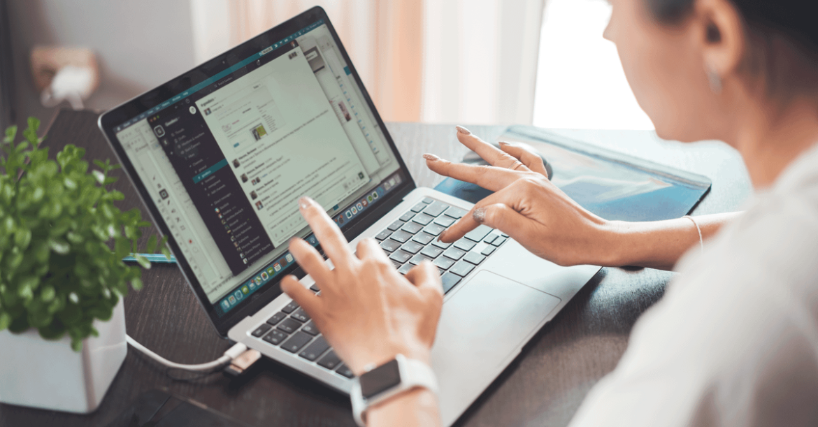 Online forum administrator reviewing a security patch notice on a laptop after the vBulletin RCE vulnerability disclosure
